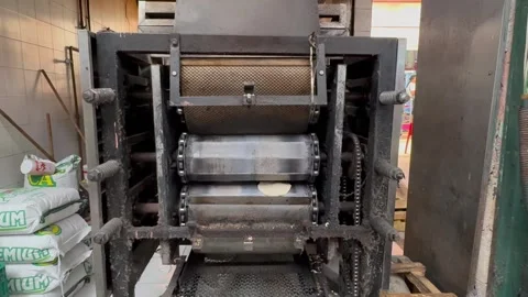 Machine making tortillas in market in Merida, Mexico Stock Footage 314742268