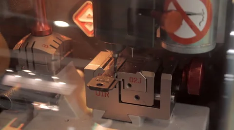 Machine for manufacturing duplicate keys to the castle makes automatic. Closeup Video stock 57537250