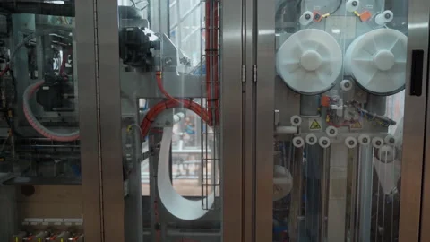 Machine mechanism for production of packaging labels closeup Stock Footage 155521789