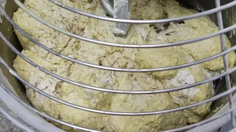 The machine mixes the dough Stock Footage 164071363