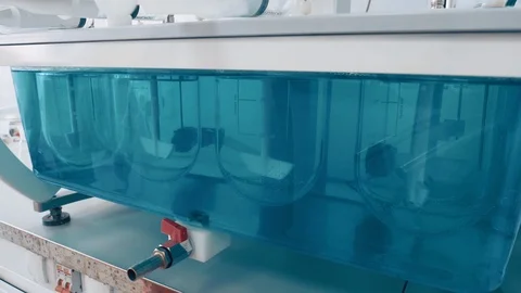 Machine mixes a solution for the invention of a new therapeutic drug Vídeo Stock 119201107