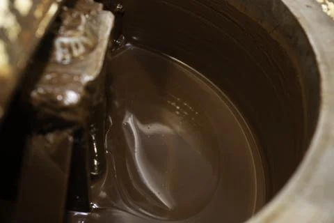 Machine for mixing chocolate. Close up Foto stock