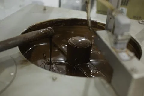 Machine for mixing chocolate. Close up Foto stock