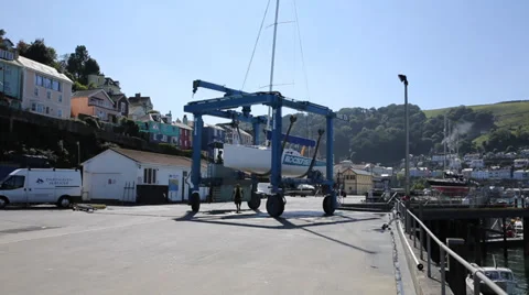Machine moving boat on harbour prior to steam cleaning 動画素材 29033824