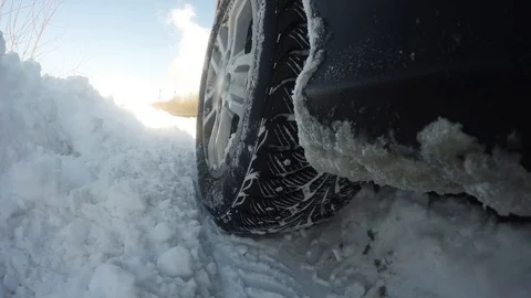 The machine is moving in a difficult terrain. All in the snow, SUV in harsh Video stock 87782357