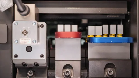 Machine operate punching and cutting sheet metal strip Stock-Footage 160761783