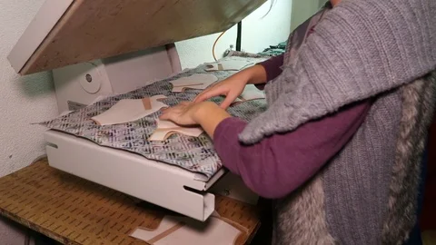 Machine operator for processing of raw leather, Processing of Raw Leather Stock Footage 90251367