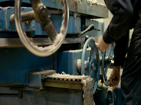 Machine operator twists the wheel Stock Footage 75583172