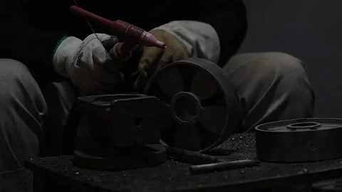 Machine operator wearing safety gear doing TIG and Mig welding. Stock Footage 252116611