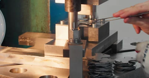 Machine operator working at a punch press, close-up Stock Footage 338993896