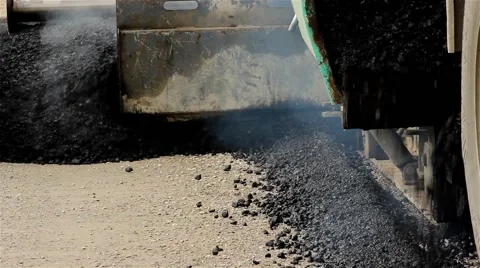 Machine for paving apply asphalt to road. Asphalting. Road works. Close up. Stock Footage 41721081