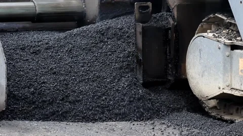 Machine for paving apply asphalt.Tilt up to the worker who controls the machine. Stock Footage 41459291