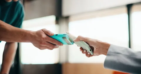Machine, phone and hands of cashier with customer for payment, pos or loyalty Stock Footage 335753232