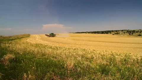 Machine plowing a field Stock Footage 78523777