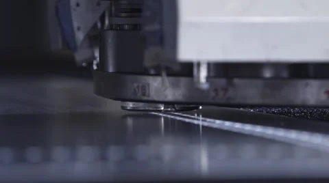 Machine pounding holes in sheet metal Stock Footage 63230079