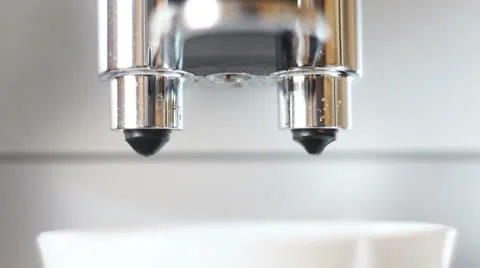 Machine pouring coffee extremely close-up Stock Footage 26402476