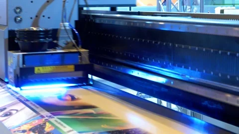 Machine printing a large size poster sample Stock Footage 169076501