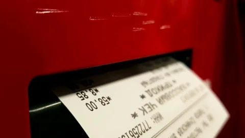 The machine prints a receipt. Woman's hand takes it. Close up. Stock Footage 84077237