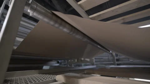 Machine processes paper surface using circular mechanism Stock Footage 296577723