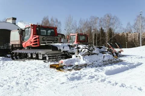 A machine for processing and compacting snow slopes. A snow groomer makes s.. Stock Photos