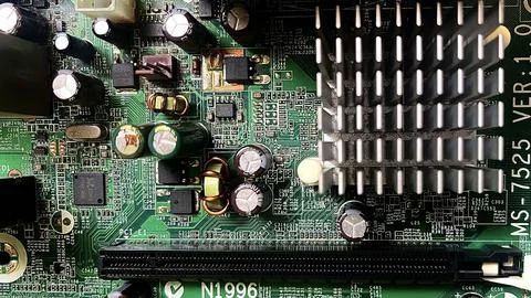 Machine processing chip - closer view Stock Photos
