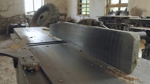 The machine for processing wood with sawdust in an old sawmill Stock Footage 85351601