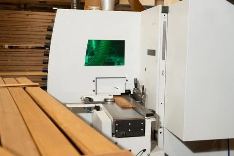 Machine for processing wooden blanks. Stock Photos