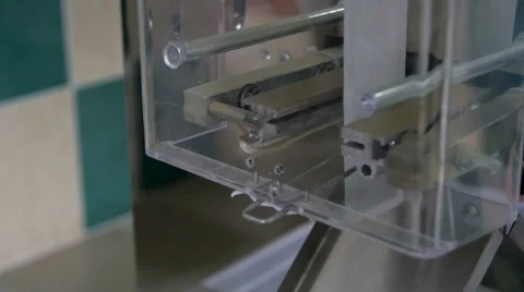 Machine produces packages of tea Stock Footage 68139487