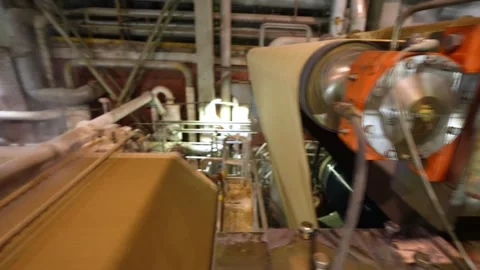 A machine for the production and packaging of cellulose sheets. Paper production Stockbeeldmateriaal 301822578