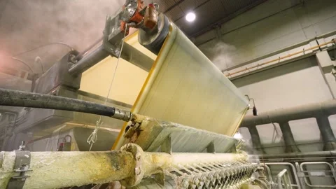 A machine for the production and packaging of cellulose sheets. Paper production Video stock 301822782