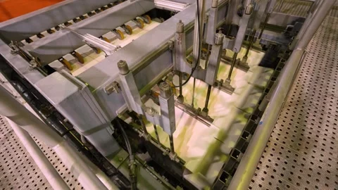 A machine for the production and packaging of cellulose sheets. Paper production Stockbeeldmateriaal 301824353