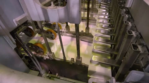 A machine for the production and packaging of cellulose sheets. Paper production Stockbeeldmateriaal 301824403