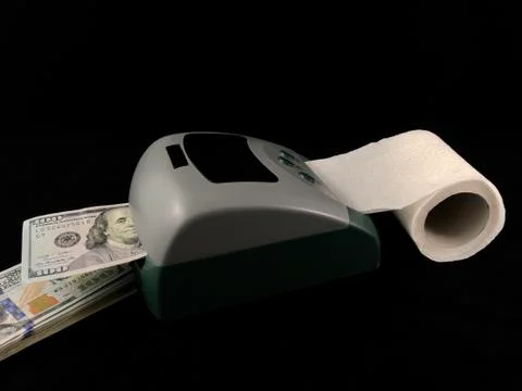 A machine for the production of dollars. Making dollars from toilet paper. Fa Stock Photos