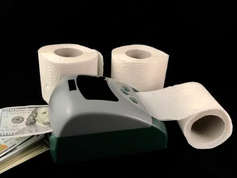 A machine for the production of dollars. Making dollars from toilet paper. Fa Stock Photos
