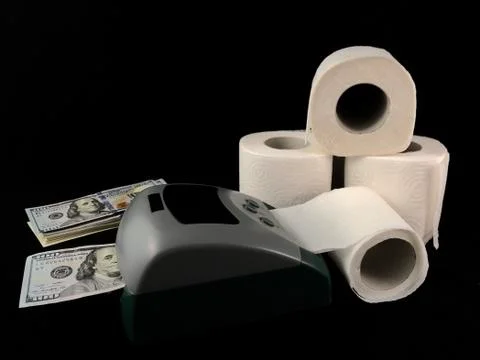 A machine for the production of dollars. Making dollars from toilet paper. Fa Stock Photos