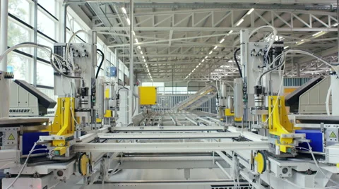 Machine in a production line assembling products Stock Footage 63007470