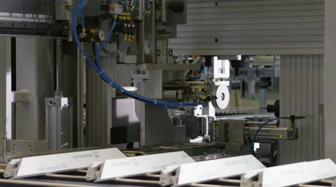 Machine in a production line assembling products Stock Footage 63011907