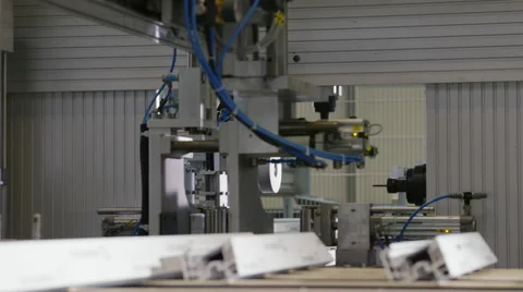 Machine in a production line assembling products Stock Footage 63019266