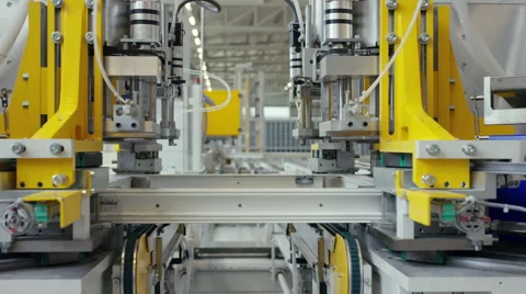 Machine in a production line assembling products Stock Footage 63029740