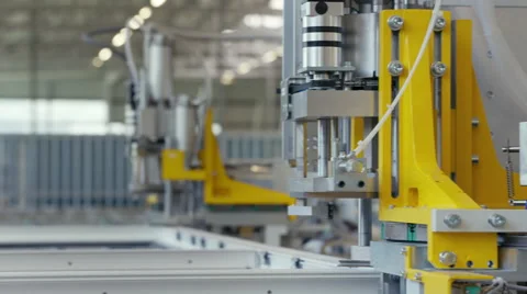 Machine in a production line assembling products Stock Footage 63029905