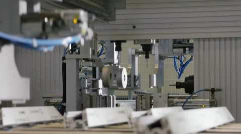 Machine in a production line assembling products Stock Footage 63030049