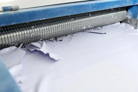Machine for the production of powder paint. A layer of plastic is cut, crushe Stock Photos