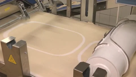 The machine for the production of thin dough Stock Footage 105402589