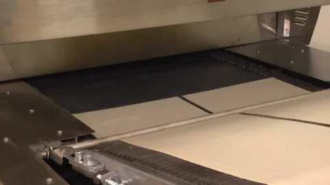 Machine for the production of thin dough. Pita Stock Footage 105402596