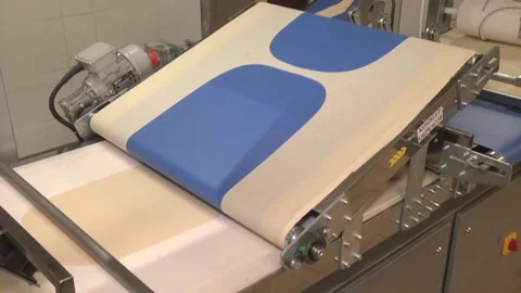 Machine for the production of thin dough. Pita Stock Footage 105402601