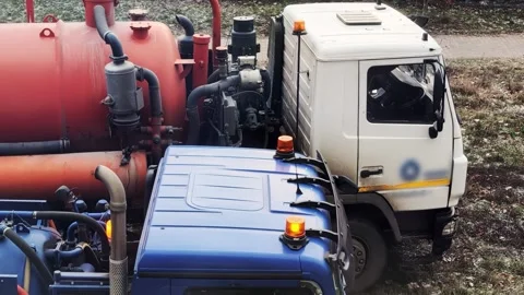 Machine for pumping septic tanks. Vacuum specialized equipment for pumping Stock Footage 303621706