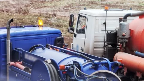 Machine for pumping septic tanks. Vacuum specialized equipment for pumping Stock Footage 303621812