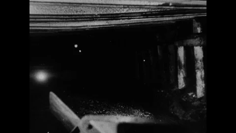 Machine putting coal on treadmill, adventure of coal, united kingdom, 1947 Stock-Footage 131532465
