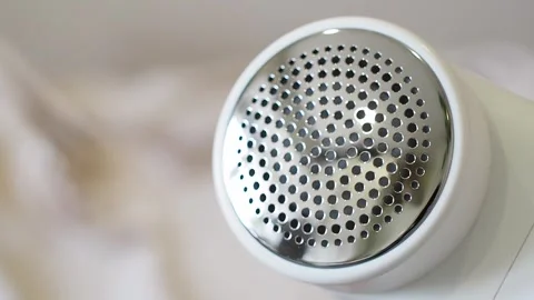 Machine for removing pellet and spools from clothes and fabric. 스톡 동영상 270530561