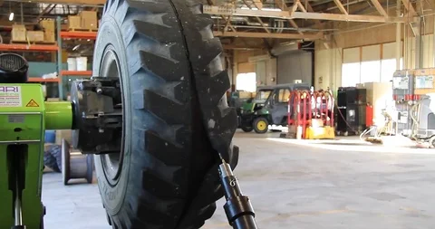 Machine for the replacement of a rim Stock Footage 101669329